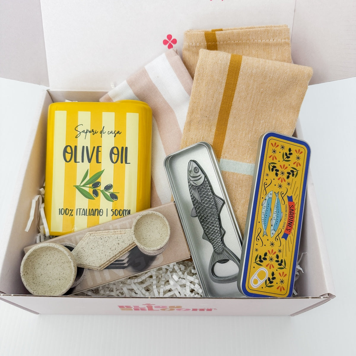Gift box containing an 'Olive Oil Tin' Ceramic Vase, a 'Sardine' bottle opener, tea towels, and a ceramic double spoon | Perth Gift Delivery