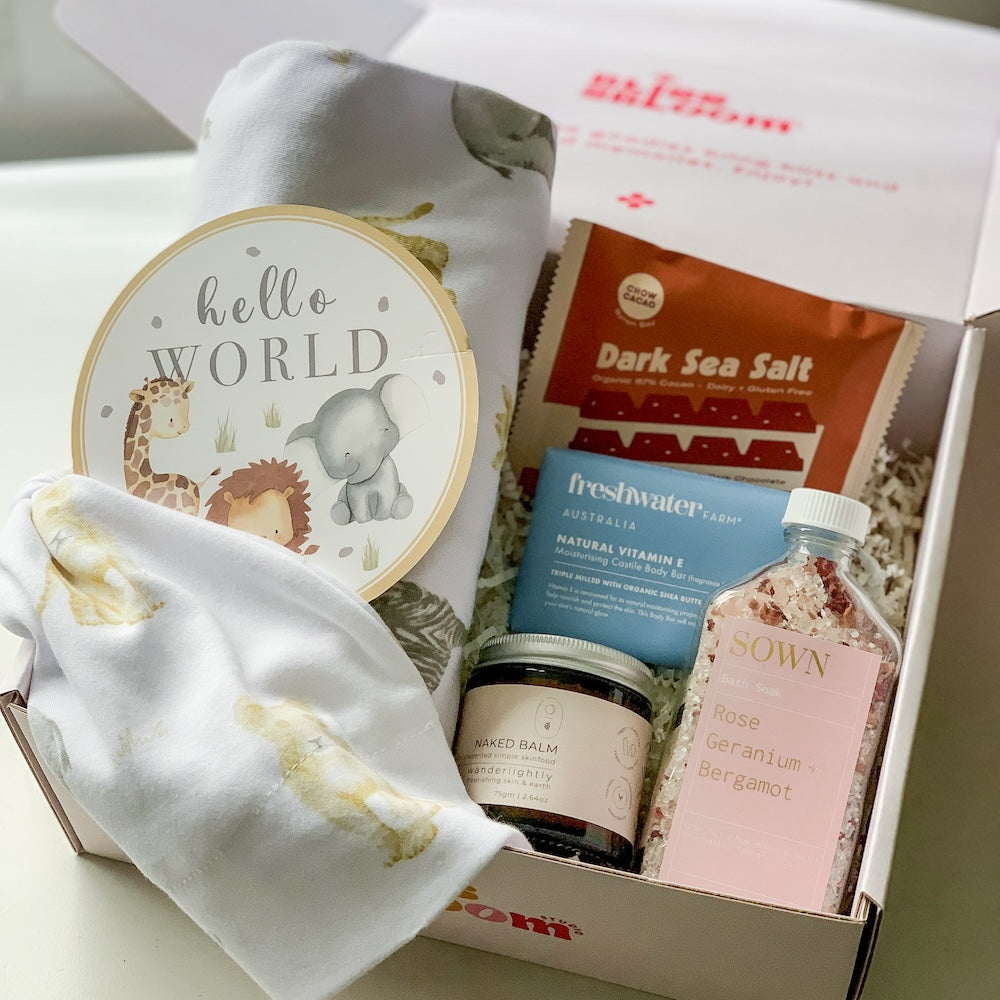 Mum and Baby Boy Gift Hamper Filled With Chocolate, Body Bar, Bath Soak, Unscented Moisturiser, Swaddle, Birth Announcement Card, and Beanie Hat For Same-Day Delivery Around Perth