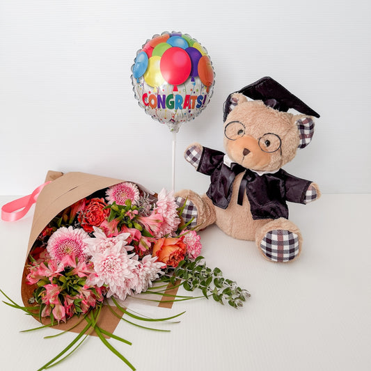 Graduation-themed teddy bear with a 'Congrats!' balloon and Double bunch flower bouquet on a white background | Perth Graduation Flowers Delivery