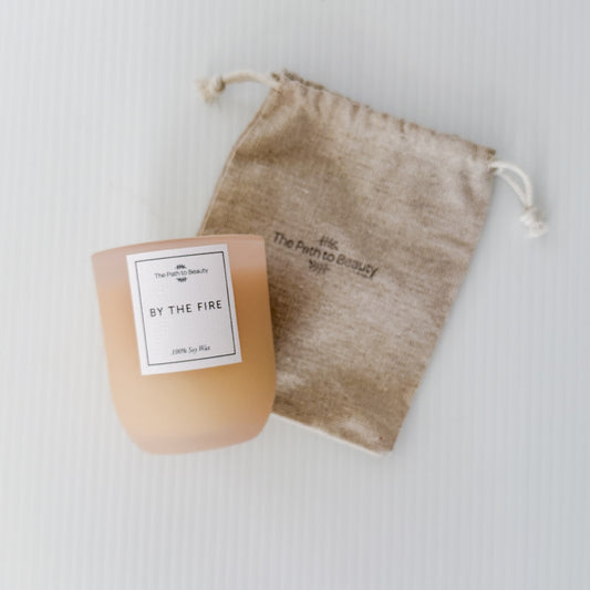 100% soy wax candle labeled 'By the Fire' with a drawstring pouch | Flower Gift Add-On | Perth Delivery