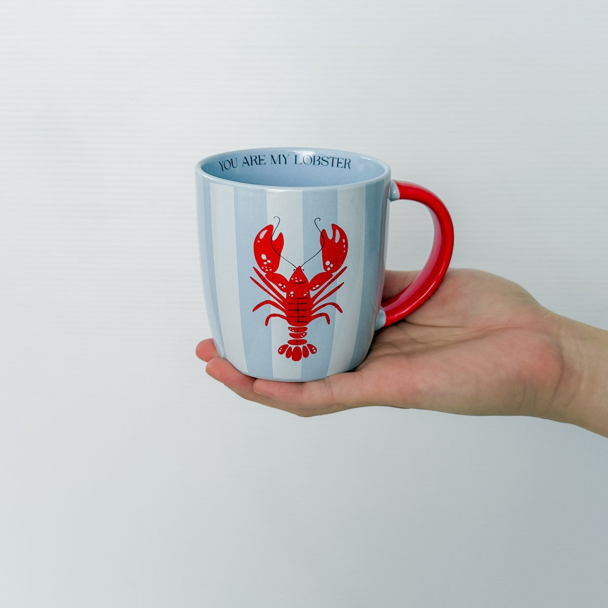 Blue and white striped mug with red lobster design and 'You Are My Lobster' text