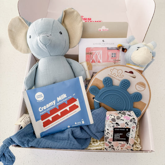 Hello Baby Boy Gift Hamper Filled With Chocolate, Luxury Bath Soap, an Elephant Soft Toy, Silicone Muslin Teether, Soft Rattle, and Milestone Cards For Same-Day Delivery Around Perth