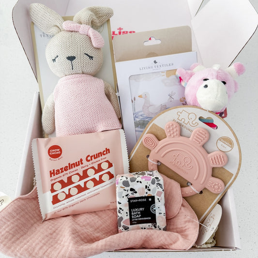 Hello Baby Girl Gift Hamper Filled With Chocolate, Luxury Bath Soap, a Bunny Soft Toy, Silicone Muslin Teether, Soft Rattle, and Milestone Cards For Same-Day Delivery Around Perth