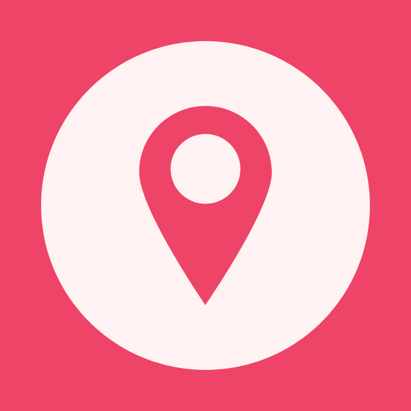 A pink location pin icon centered inside a large white circle on a solid pink background.